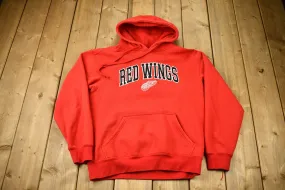 Vintage 1990s Detroit Red Wings NGL Embroidered Graphic Hoodie